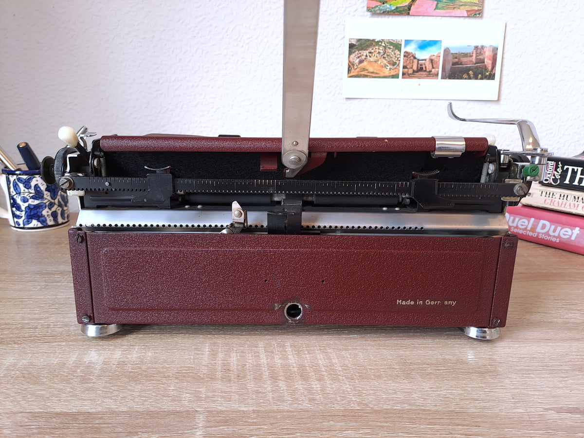 Maroon Olympia SM1 Typewriter