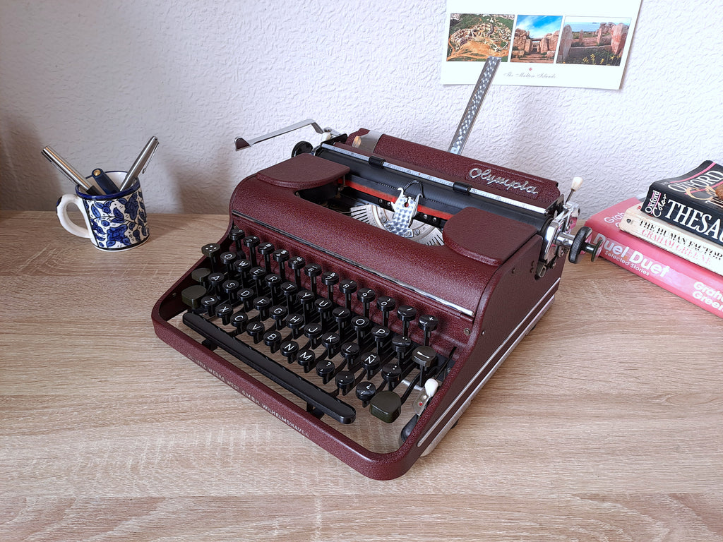 Maroon Olympia SM1 Typewriter