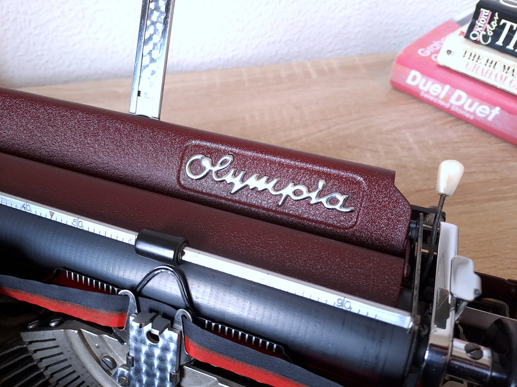 Maroon Olympia SM1 Typewriter