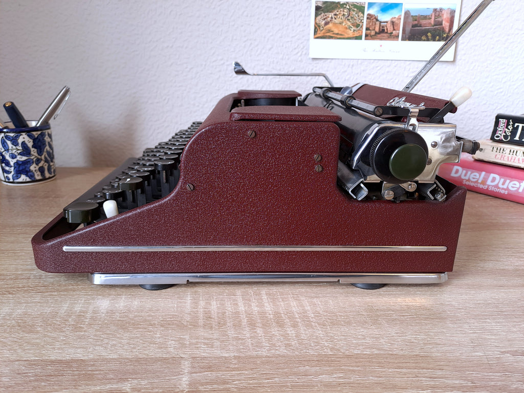 Maroon Olympia SM1 Typewriter