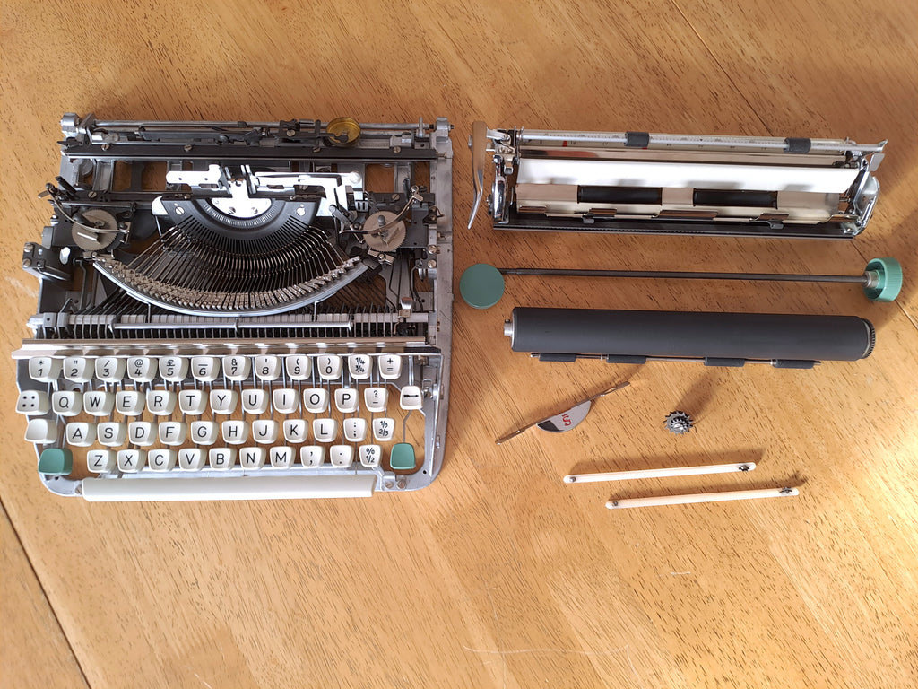 Olympia Splendid 66 typewriter with italic typeface, disassembled