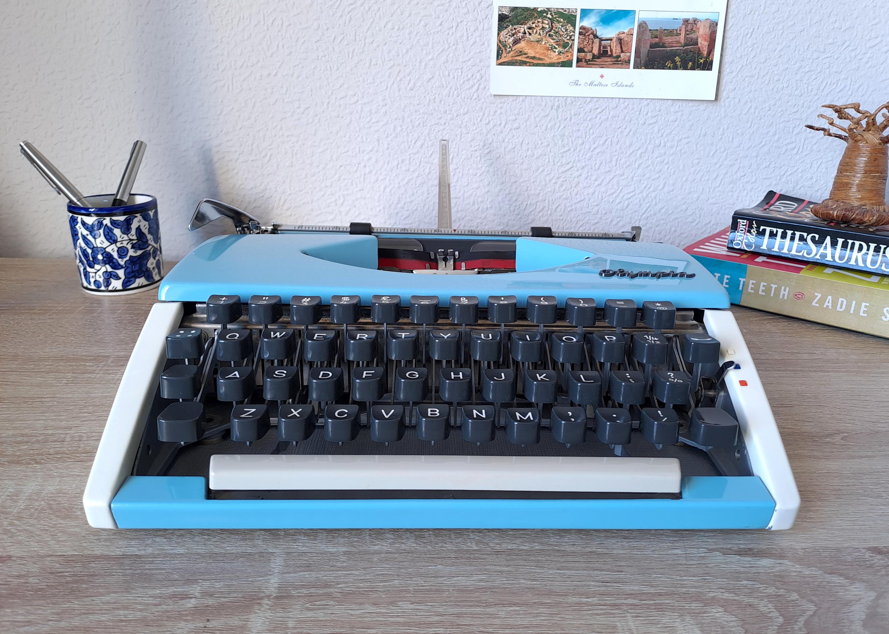 Custom-painted Script (cursive) Olympia SF Typewriter